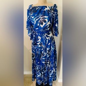 Gorgeous Floral Blue Flowy Dress. Size Small. But can fit a size medium.